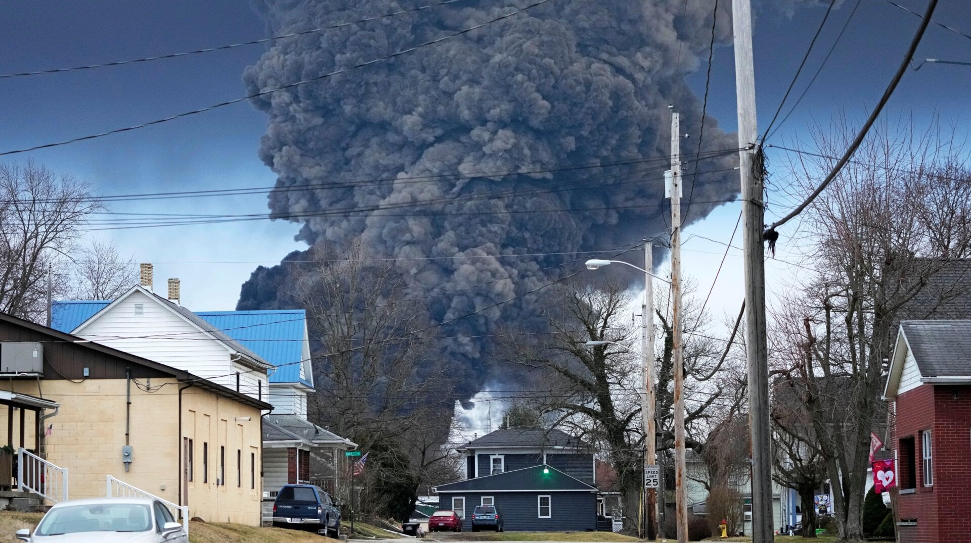 A black plume rises over East Palestine, Ohio, as a result of a controlled detonation of a portion of the derailed Norfolk Southern trains Monday, Feb. 6, 2023.