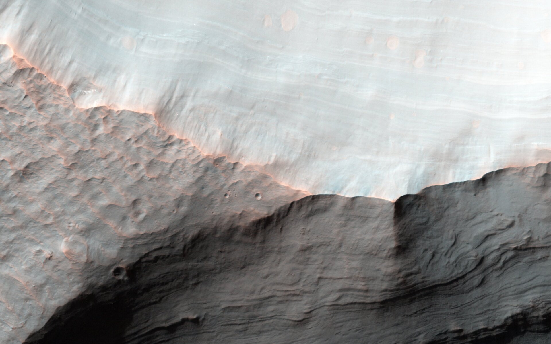 Mars’ Saheki Crater bears some alluvial fans, signs of ancient water.