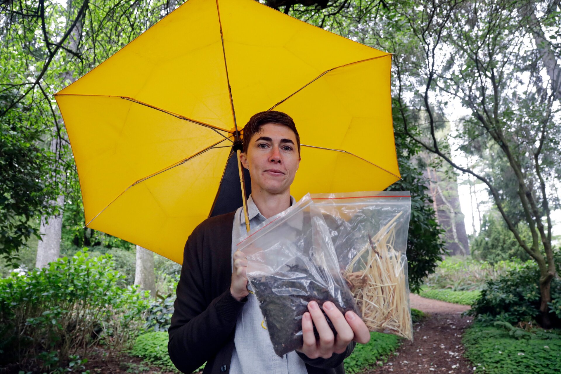 Katrina Spade, founder and CEO of Recompose, displays a sample of the compost material left from the decomposition of a cow, left, and some of the combination of wood chips, alfalfa and straw used in the process. April 19, 2019