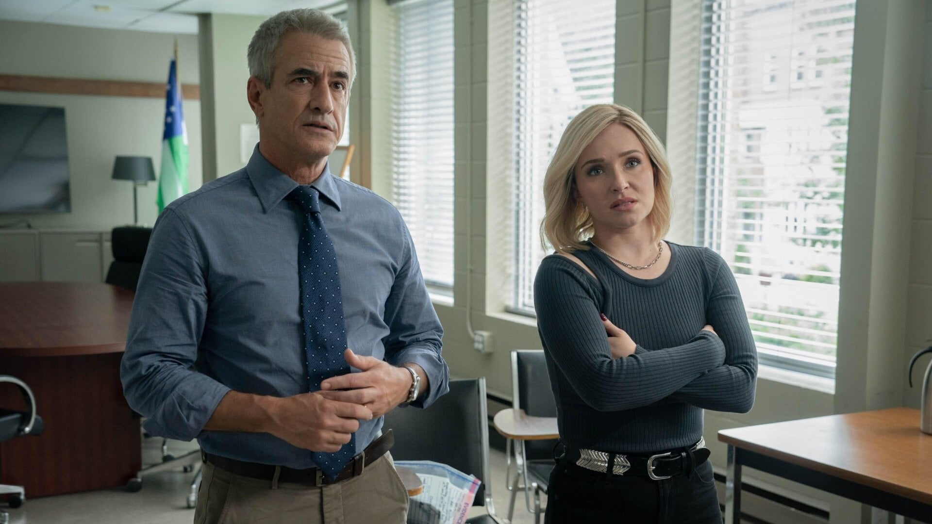 What’s Kirby doing with a cop?