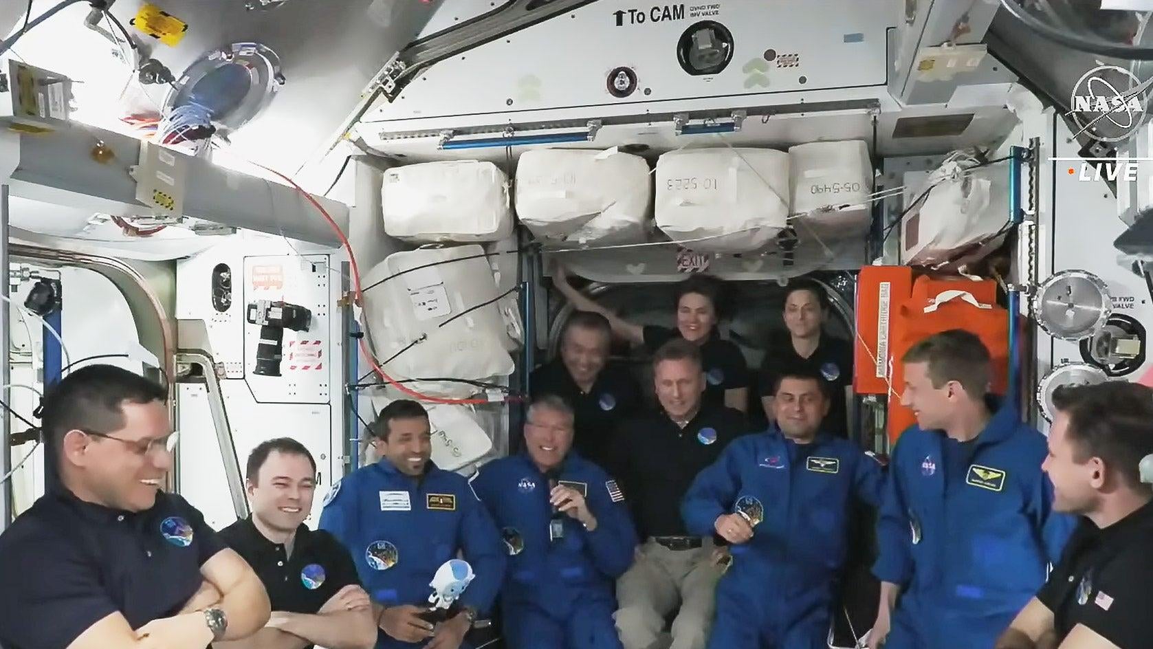 The Expedition 68 crew members welcoming Crew-6 members on board the space station.