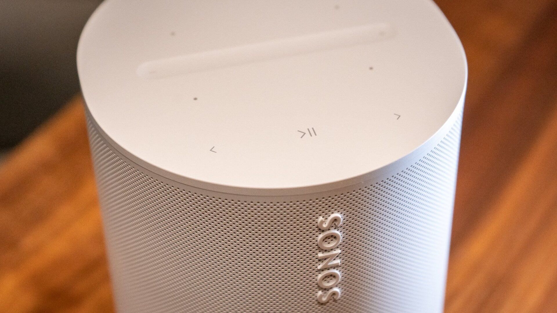 The top of the Sonos Era 100, including its capacitive volume slider. 