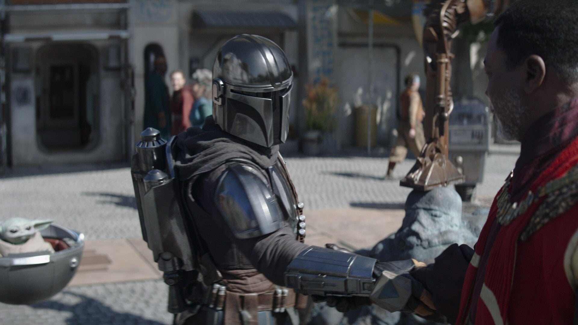 Mando and Greef reunite. 