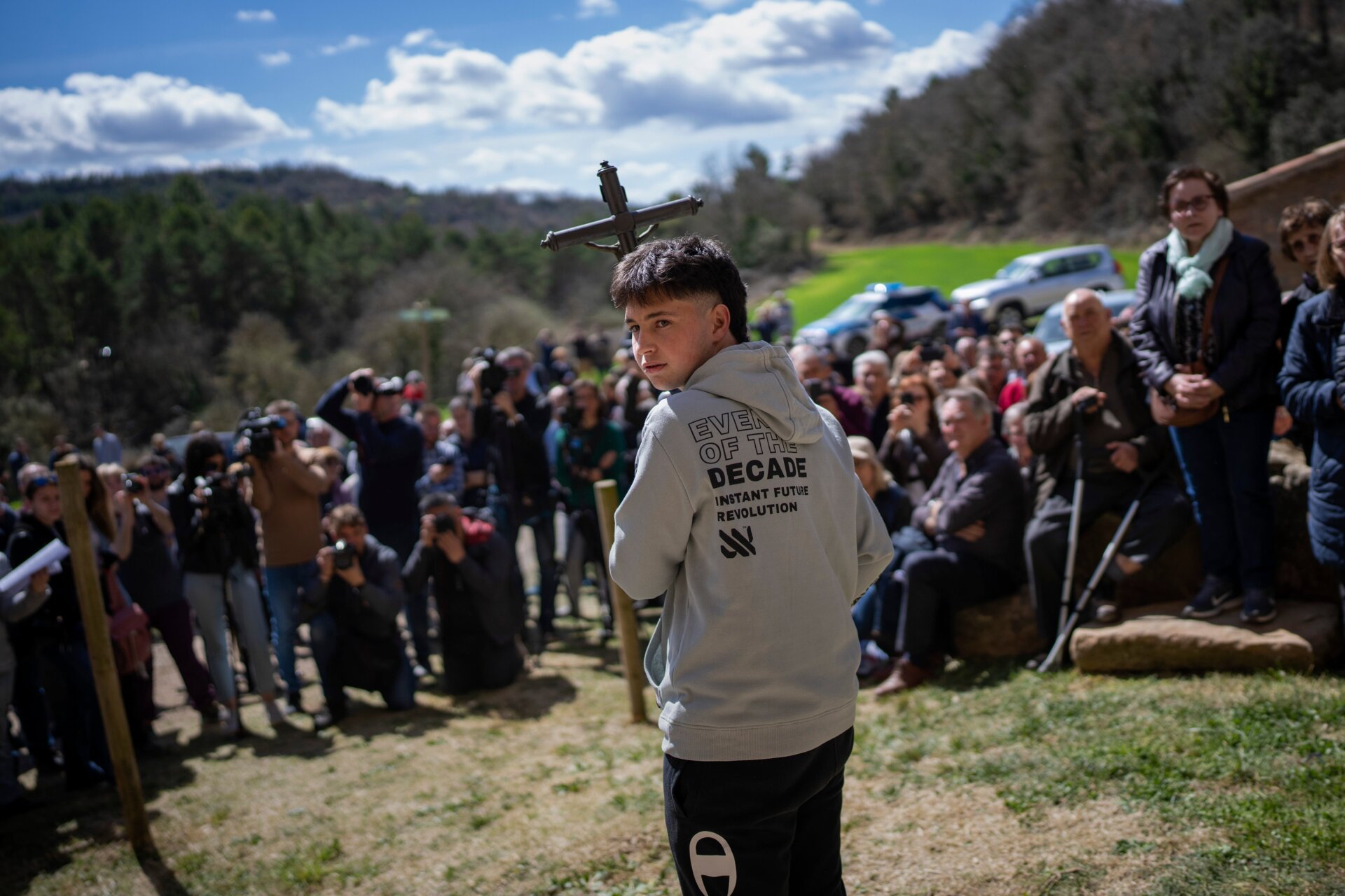 Local residents take part in a procession carrying a replica of the Our Lady of the Torrents, a virgin historically associated with drought in l’Espunyola, north of Barcelona, Spain, Sunday, March 26, 2023. 