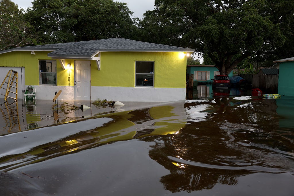 Flood waters surround a home on April 13, 2023 in Fort Lauderdale, Florida.