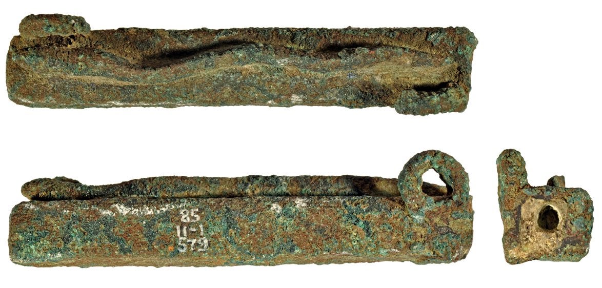 A votive box decorated with an eel figure.