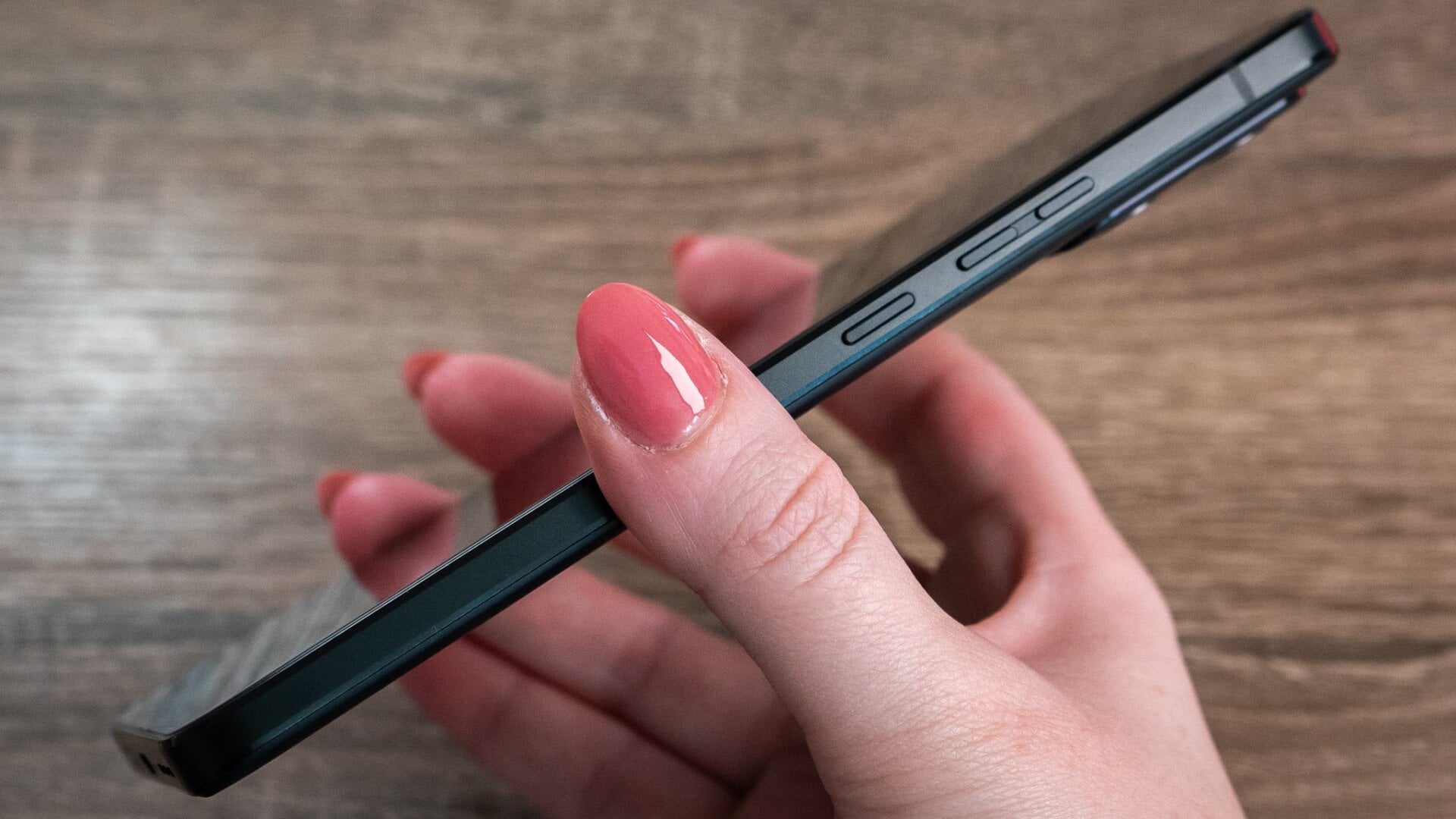 There are volume buttons and a power button on the other side.