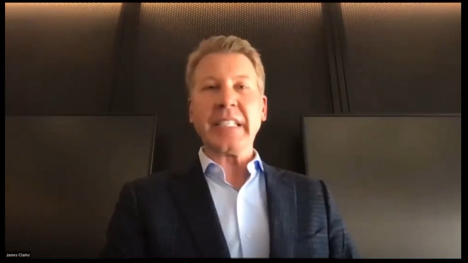 James Clarke addresses staff at his most charismatic in a virtual meeting call.