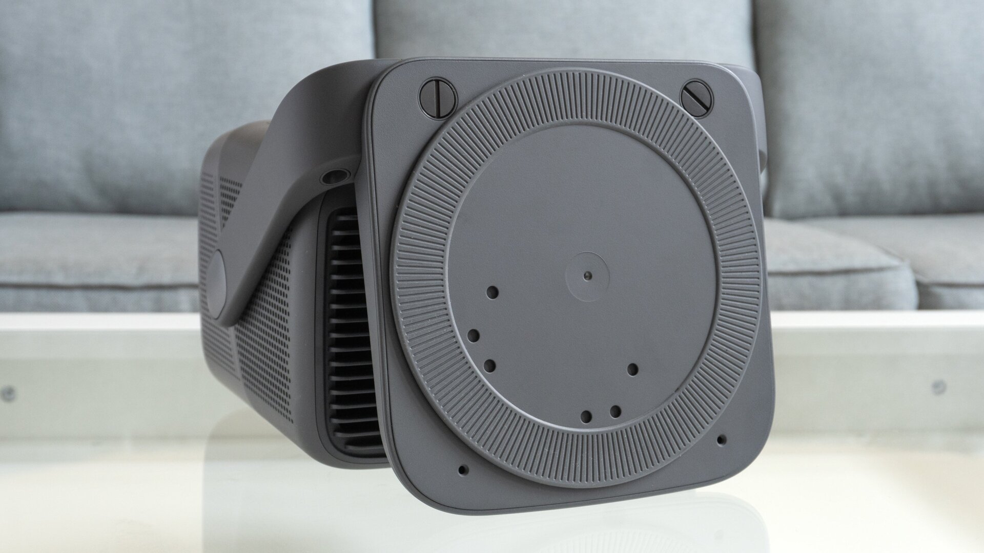 The underside of the base of the JMGO N1 Ultra projector is unfortunately lacking a tripod mount, but two removable bolts reveal threaded holes that can be used to attach the projector to a ceiling mount.