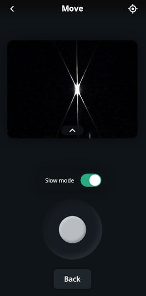 Viewing a star through the Bahtinov mask—a required step for focusing. The greyish-white ball below is the virtual joystick.