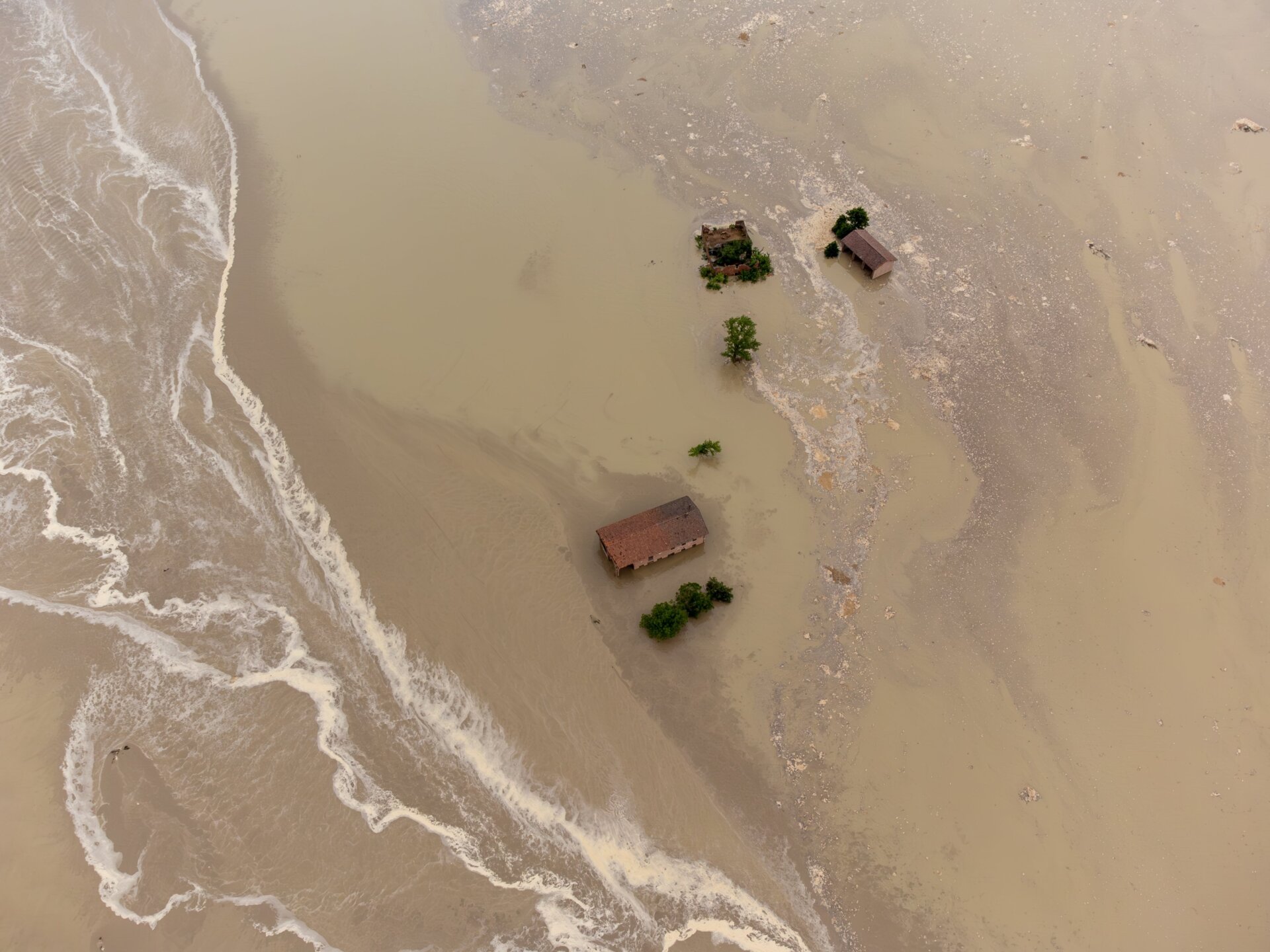 Floodwaters submerged buildings across the region of Emilia-Romagna.