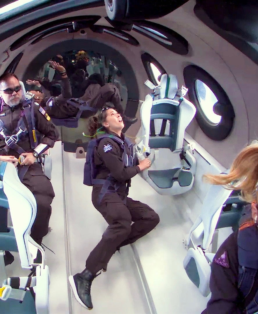 Inside the crew’s cabin during the flight as the passengers get a feel of the microgravity environment. 