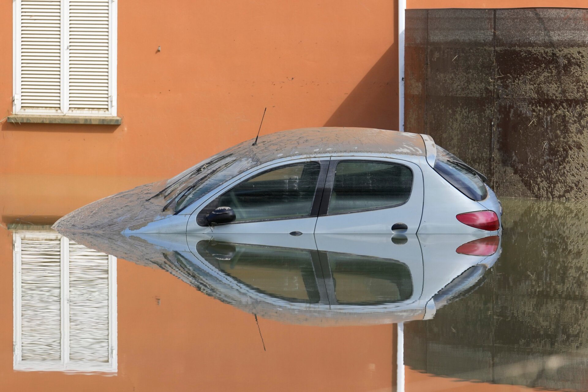 A submerged car in Faenza, Italy on May 18 following intense rains. 
