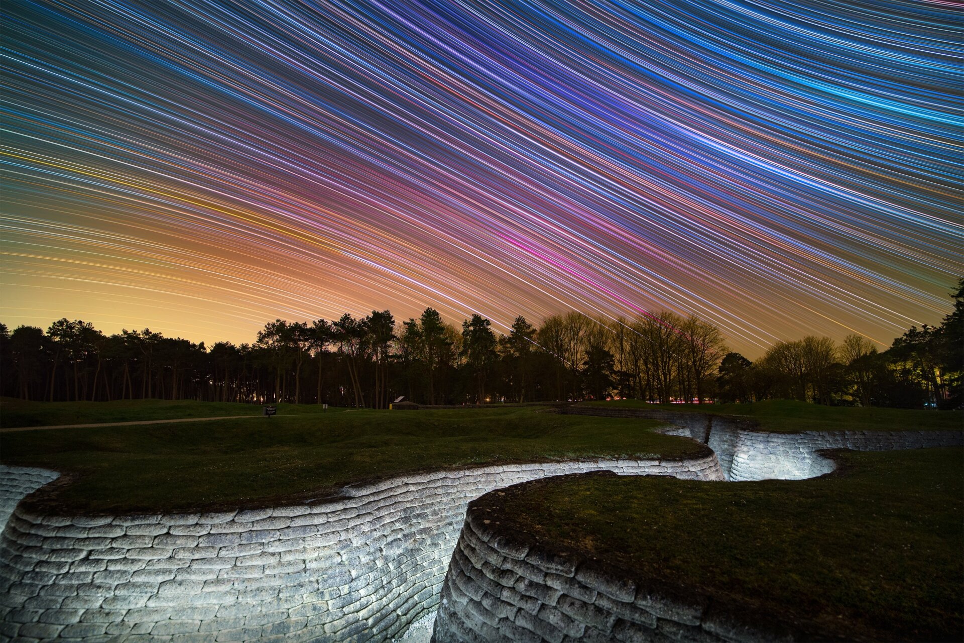 A long-exposure image of star trails over Northern France.