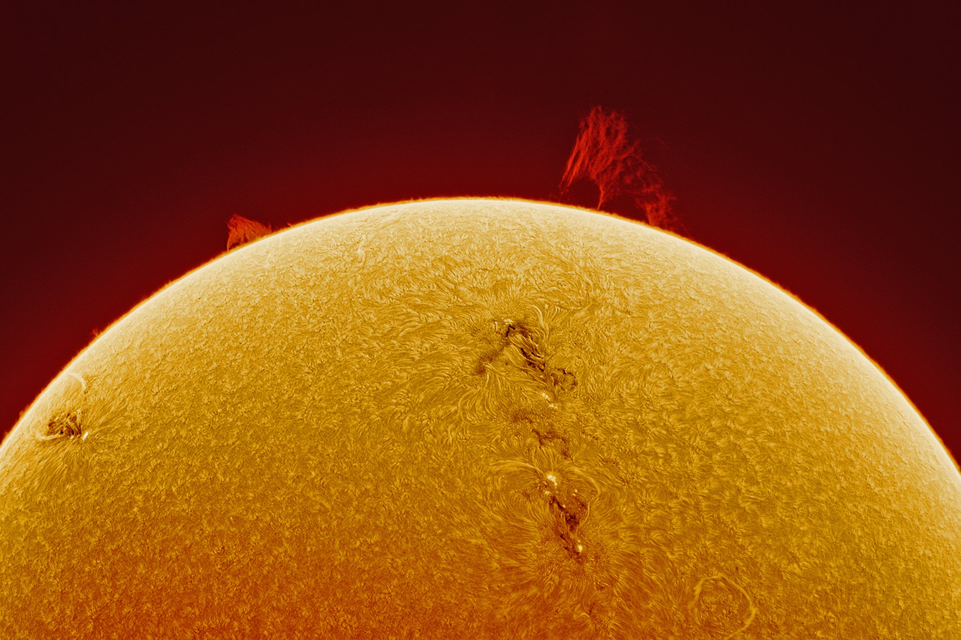 An image of the Sun showing a solar prominence—an eruption of hydrogen gas.