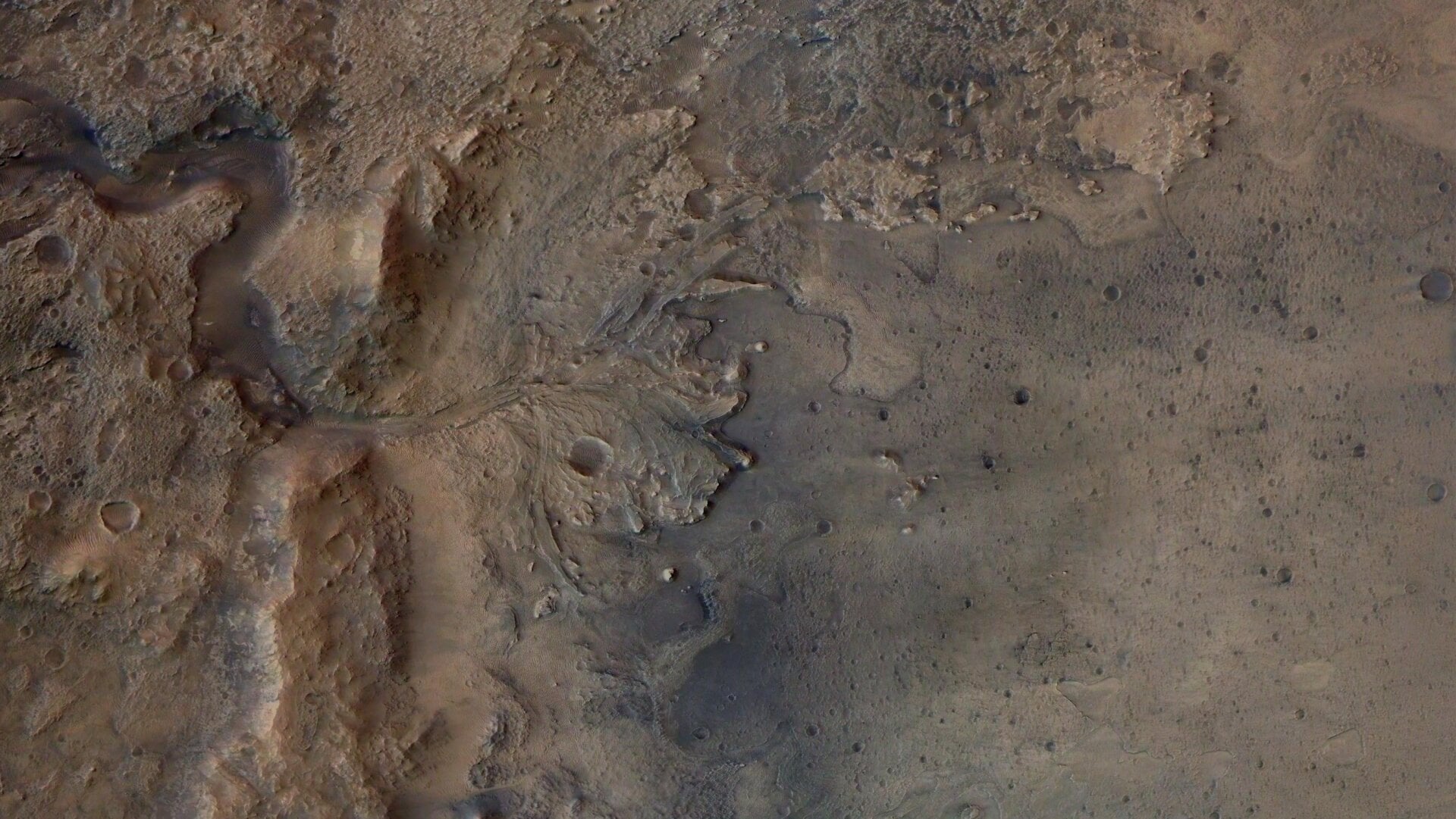 An ancient river delta flowing into Mars’ Jezero Crater.