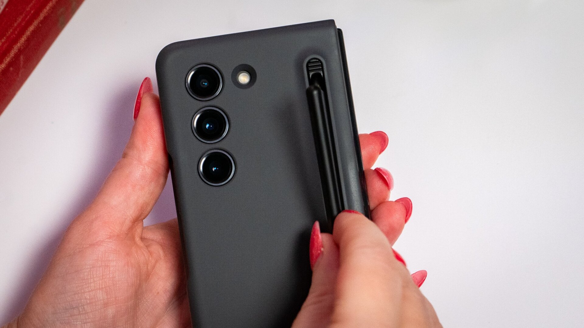 The S Pen resides in its own little housing unit on the back of the case. 