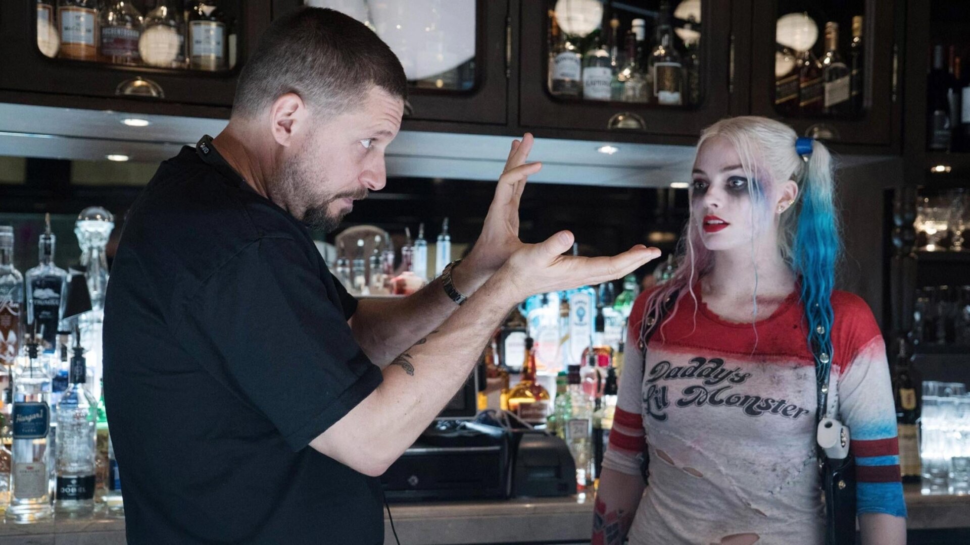 David Ayer directing Margot Robbie in 2016's Suicide Squad.