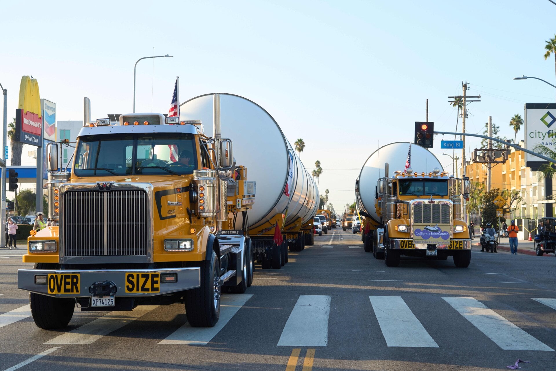 Well here’s something you don’t see everyday: Space Shuttle boosters trekking through city streets. 