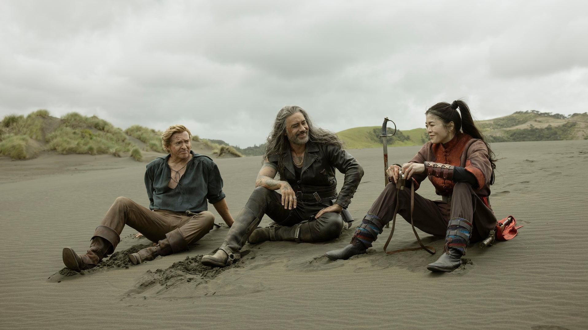Rhys Darby, Taika Waititi, and Ruibo Qian in Our Flag Means Death.