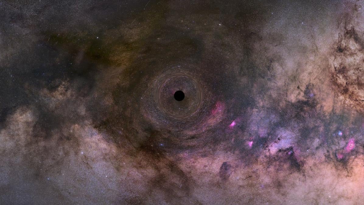 An illustration of a black hole drifting through space.