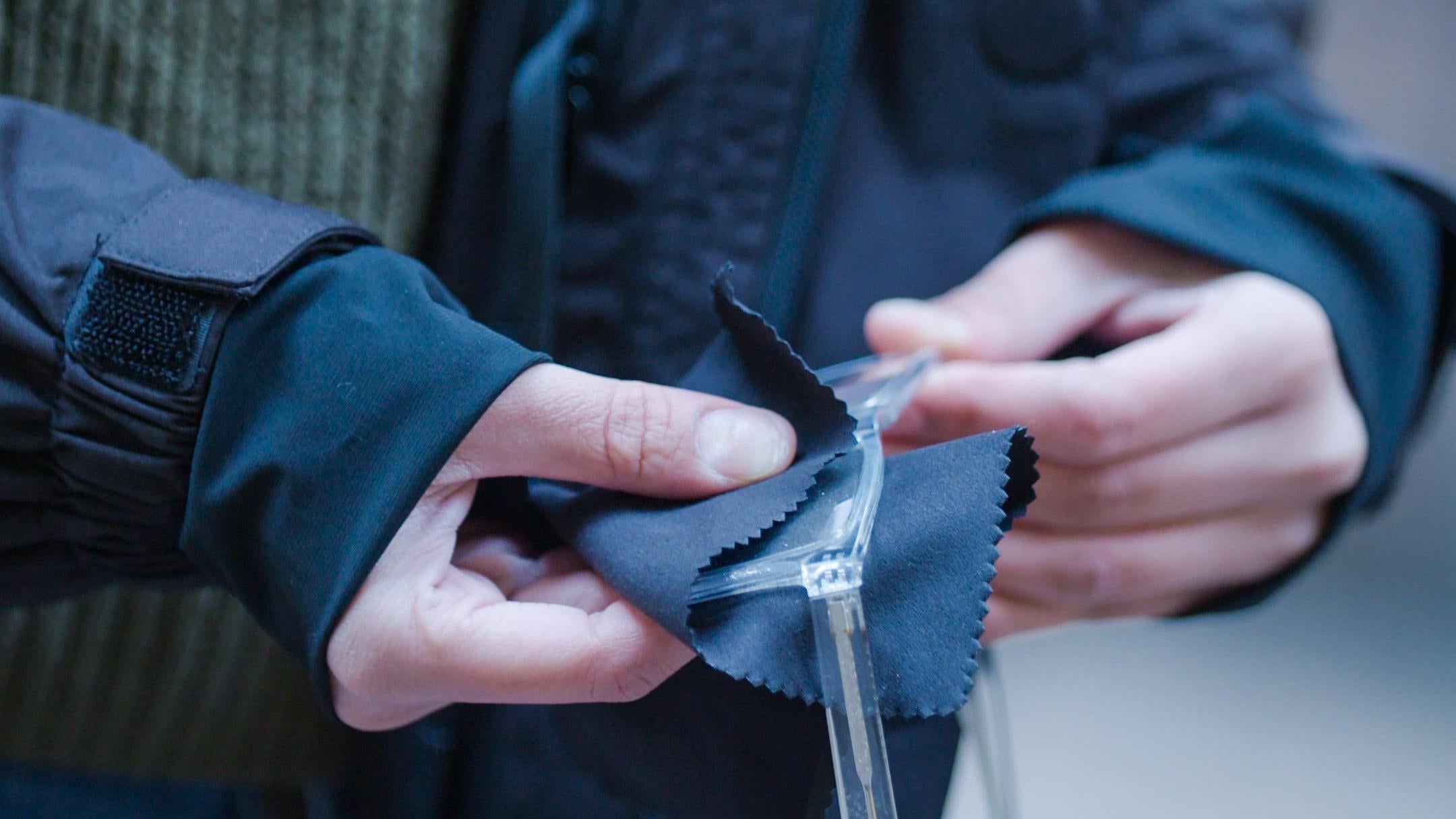 One of the pockets offers an eyeglass-cleaning cloth you can pull out anytime. 