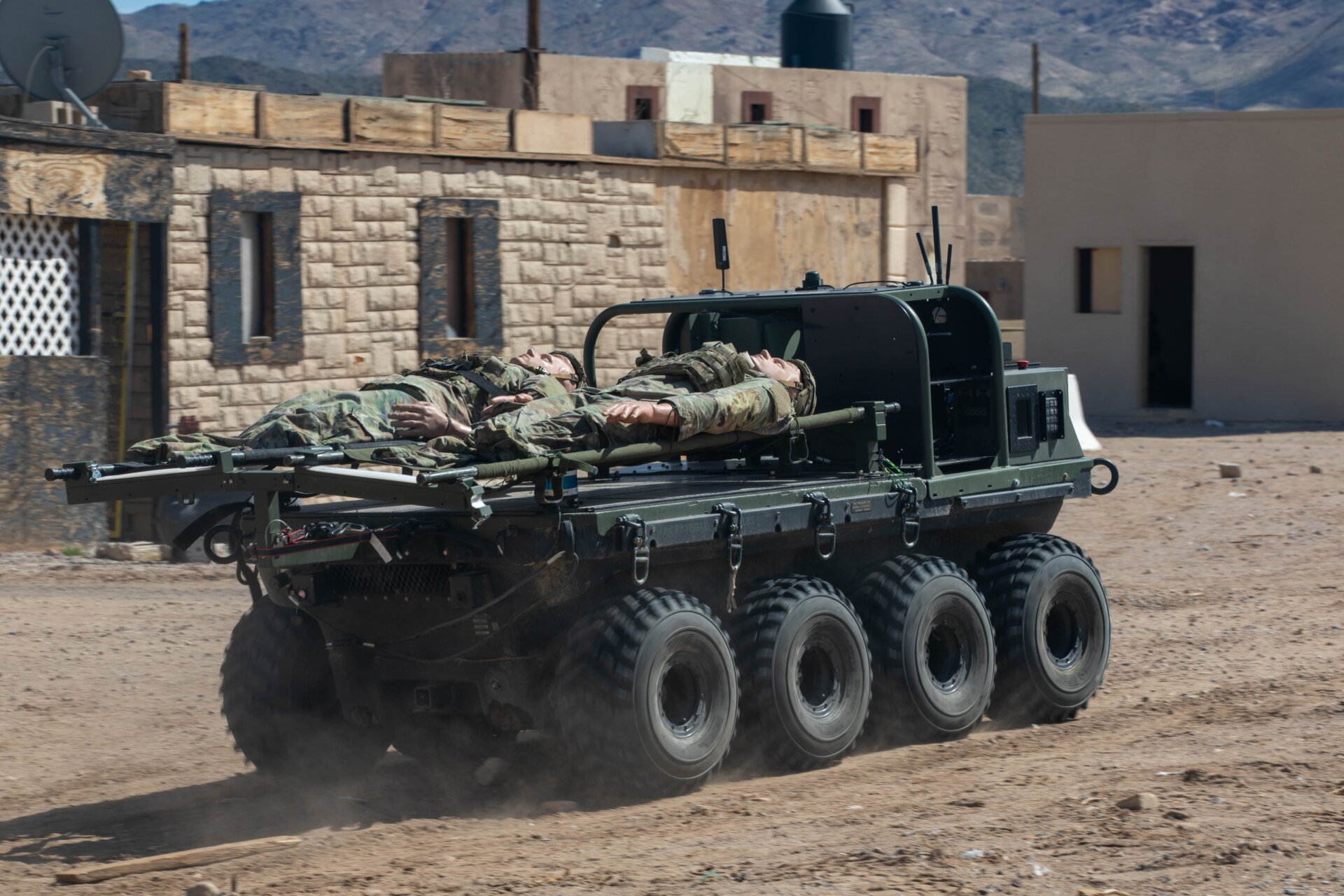 The Small Multipurpose Equipment Transport is deployed for casualty  evacuation during an urban assault with Human Machine Integration at  Project Convergence Capstone 4 at Fort Irwin, Calif., March 17, 2024. 