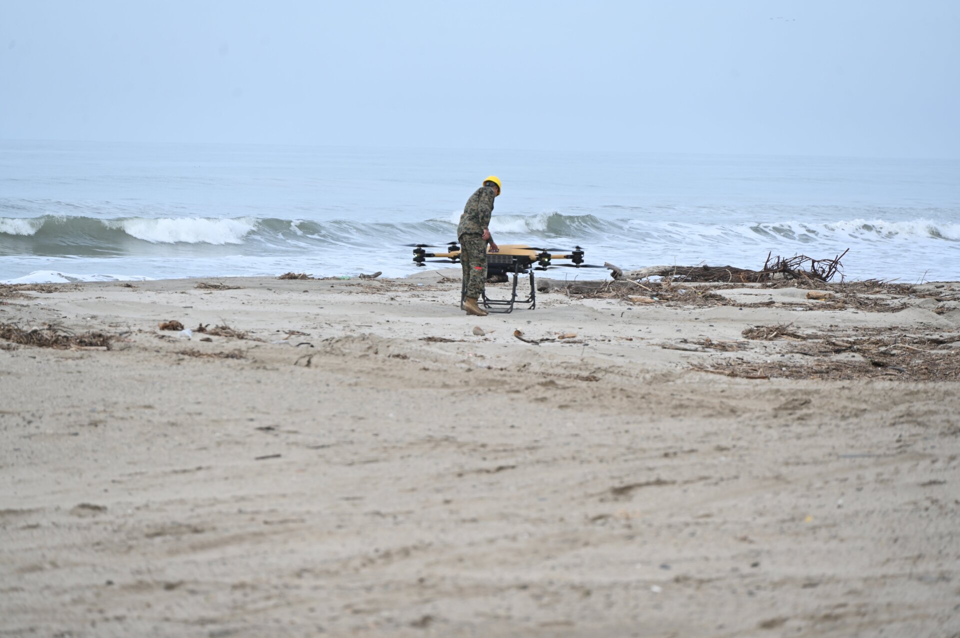 A Marine conducts experimentation utilizing the Tactical Resupply  Vehicle-150 during Project Convergence - Capstone 4 at Camp Pendleton,  CA on February 25, 2024.