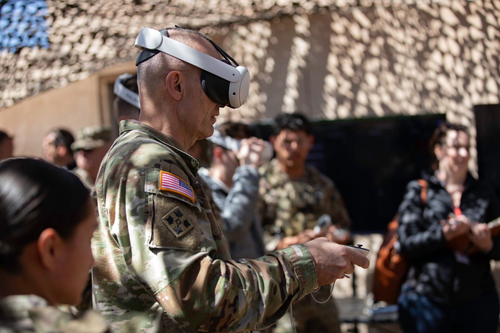 Gen. Randy George, Chief of Staff of the Army, tests new augmented  reality technology during a series of human machine integration  experiments as part of Project Convergence – Capstone 4 at Fort Irwin,  Calif., March 18, 2024. 