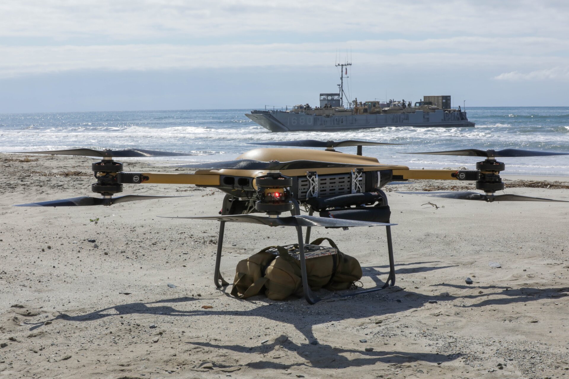The Tactical Resupply Vehicle-150 lands on the beach after a series of  contested logistics experimentations from ship to shore as part of  Project Convergence-Capstone 4 at Camp Pendleton, Calif., Feb. 29, 2024.  