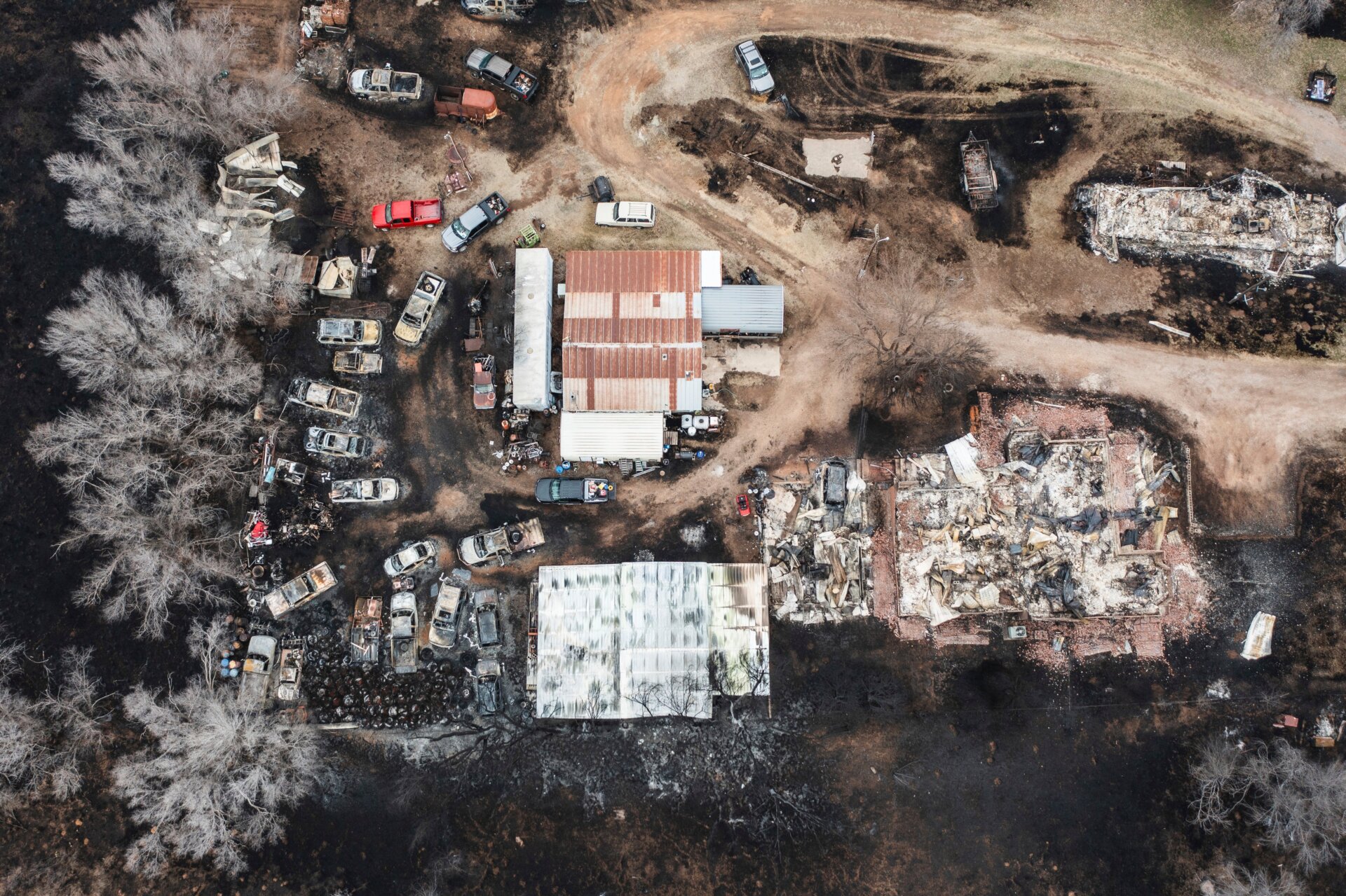 Multiple vehicles and multiple residences are seen destroyed by the  Smokehouse Creek Fire in Canadian, Texas, Thursday, Feb. 29, 2024. 