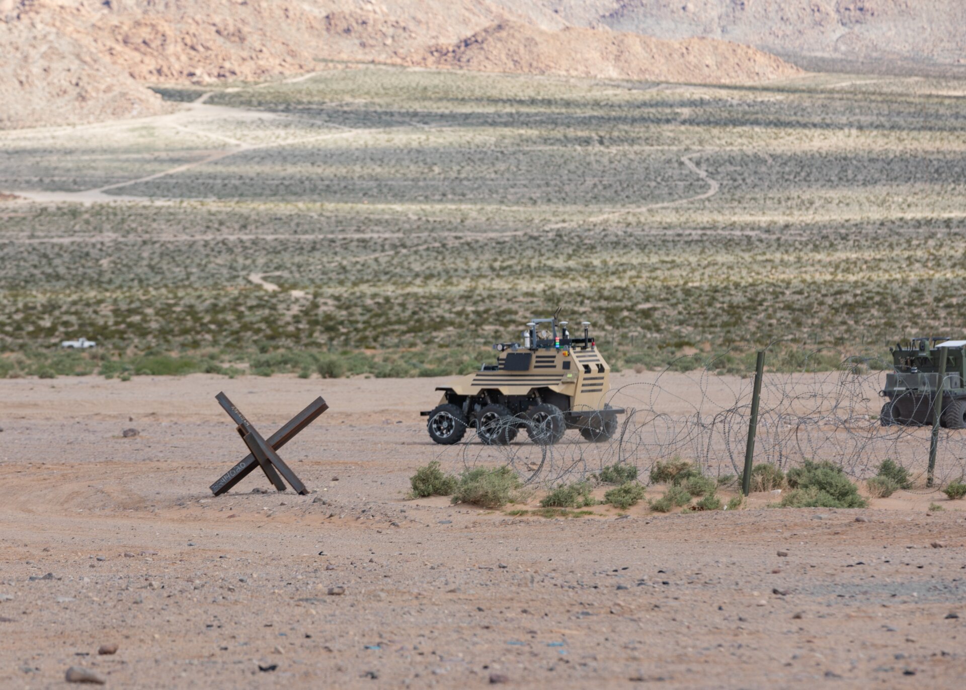 Robotic machine identified only as an “unmanned artificial intelligence vehicle” by the Army, without providing more details, photographed at Fort Irwin, Calif., March 18, 2024. 