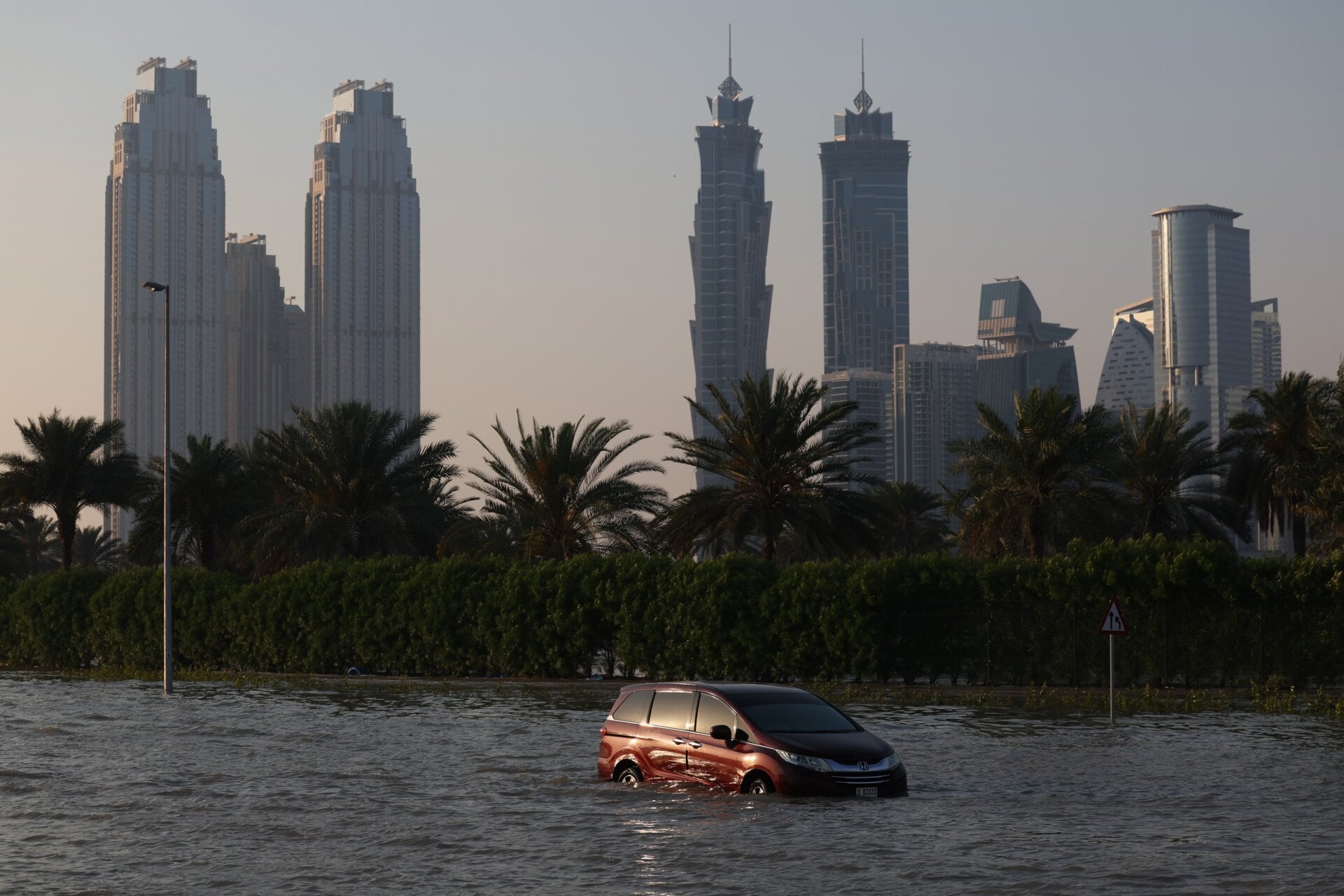An abandoned vehicle on a flooded highway after a rainstorm in Dubai, United Arab Emirates, on Wednesday, April 17, 2024. 