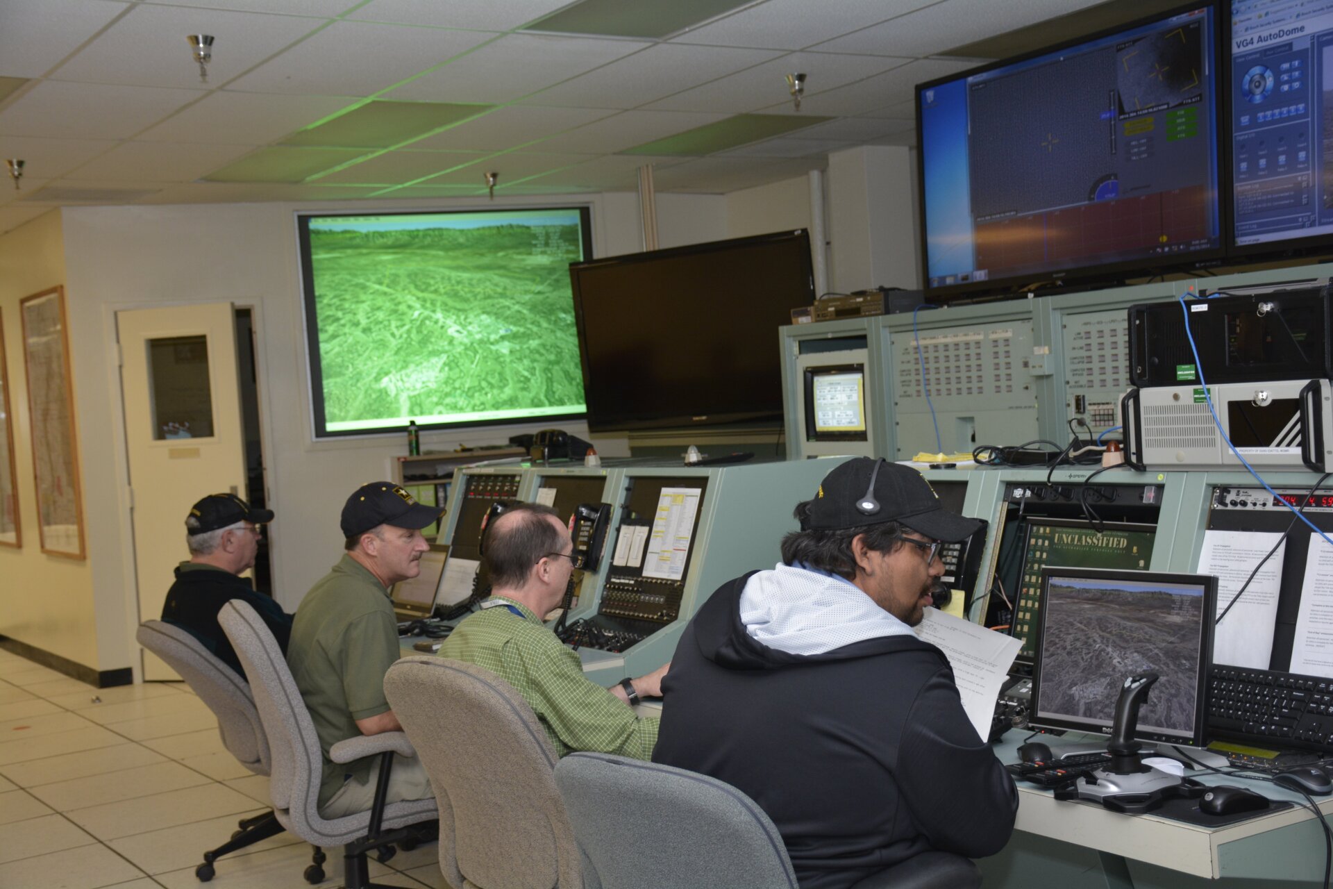 Civilians from SMDC and HELSTF conduct a test of the HEL-MD laser system at  White Sands Missile Range, New Mexico in October 2014. The control room is located in an old Cold War bunker.