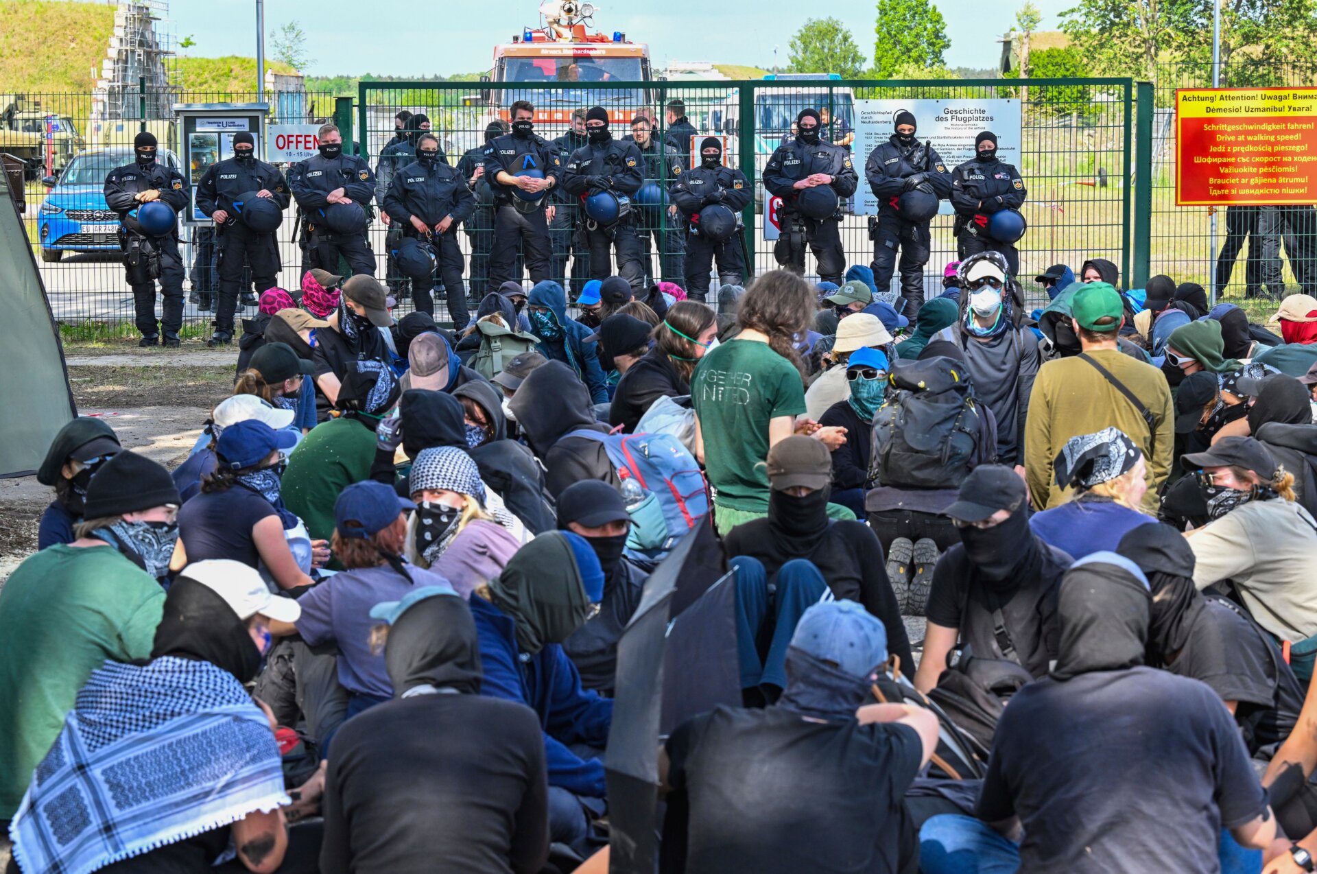 Activists block an access road to Neuhardenberg airfield on May 10, 2024.