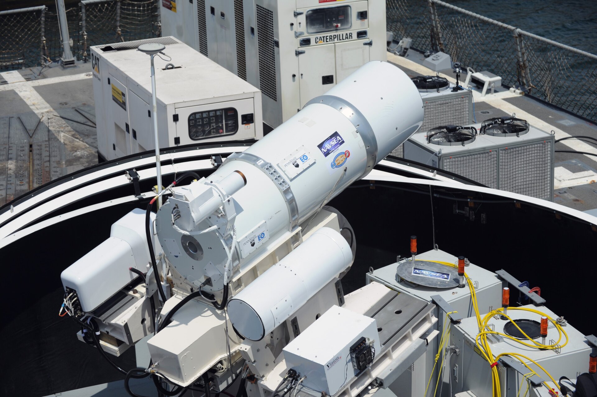 The Laser Weapon System (LaWS) installed aboard the  guided-missile destroyer USS Dewey (DDG 105) in San Diego, Calif. in 2012 as a  technology demonstrator built by the Naval Sea Systems Command from  commercial fiber solid-state lasers, utilizing combination methods  developed at the Naval Research Laboratory.