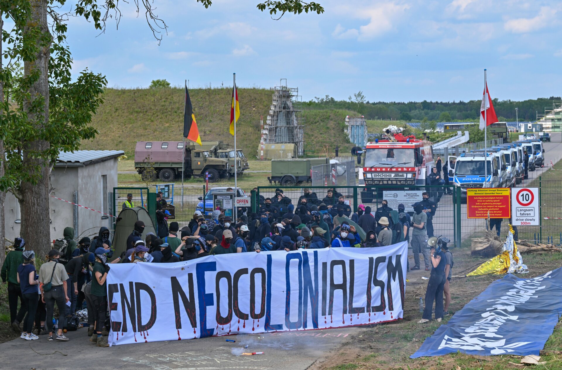 Activists block an access road to Neuhardenberg airfield on May 10, 2024.