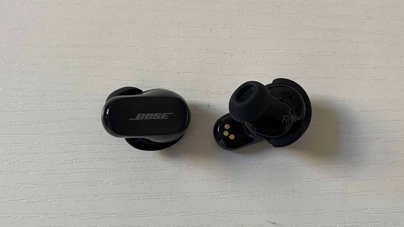 Bose QuietComfort II buds with their silicone noise canceling tips.