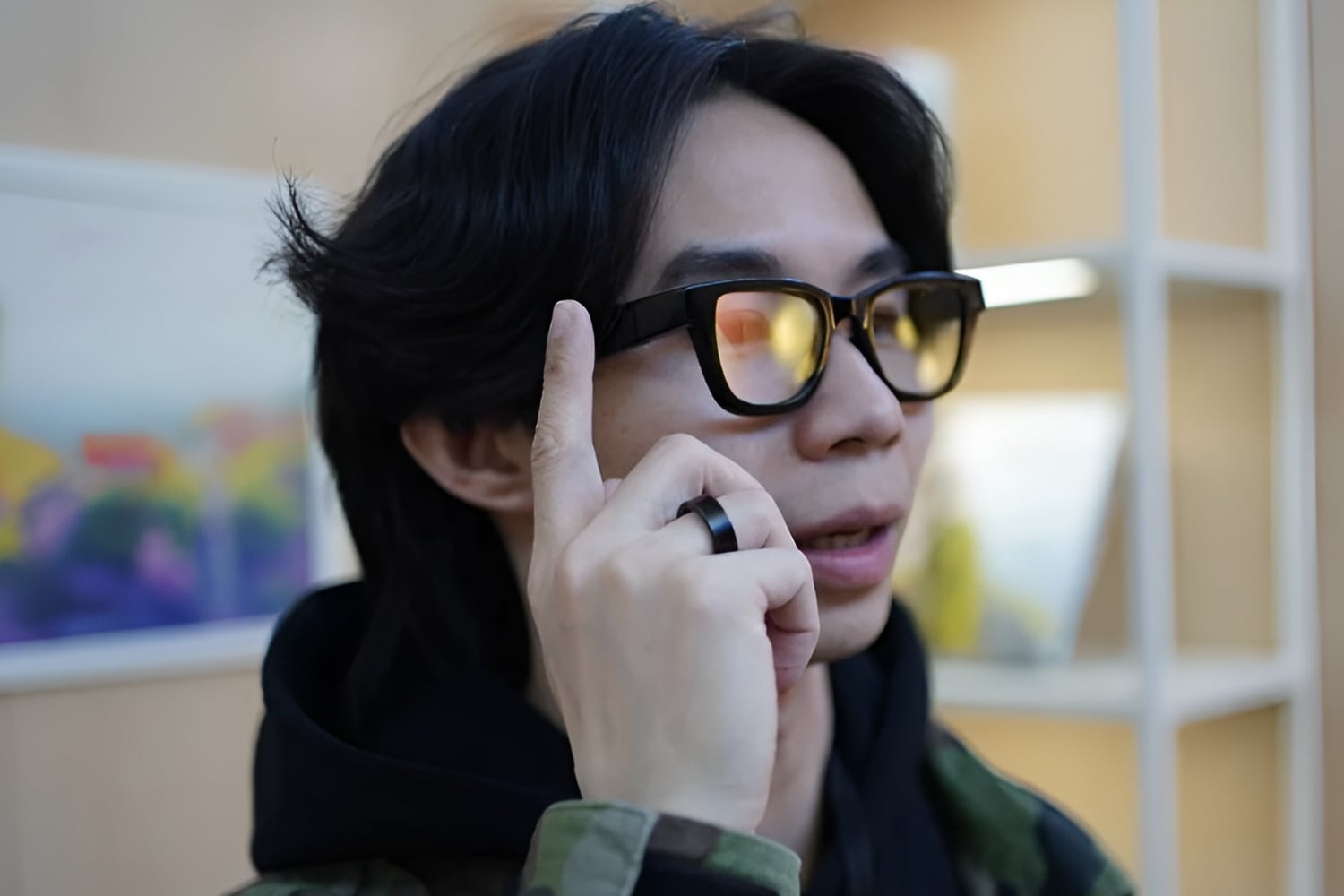Gizmodo Senior Editor, Consumer Tech wearing Google's Project Aura smart glasses.