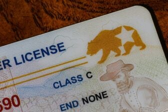 Real ID-compliant driver's license from California with a little star in a golden bear.