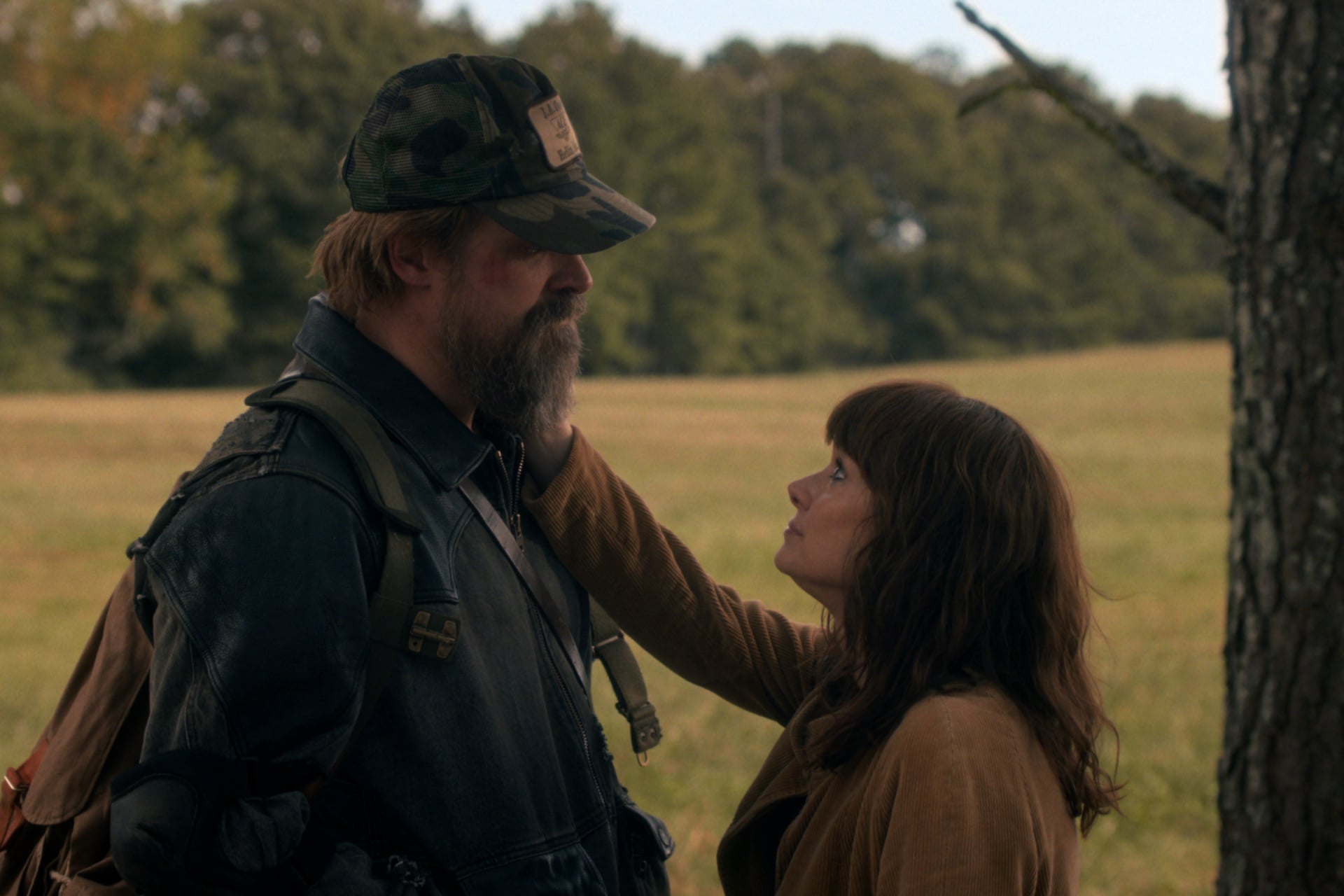 Hopper (David Harbour) and Joyce (Winona Ryder) share a tender moment.