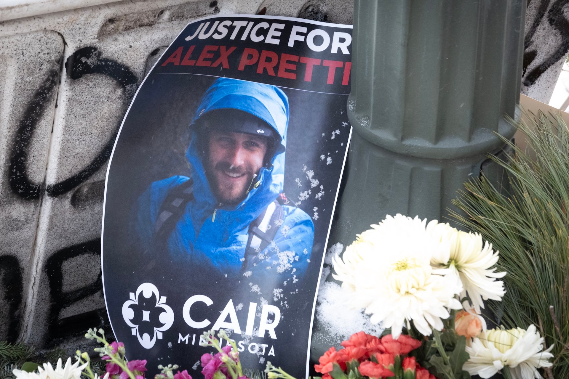 A picture sits at a memorial to Alex Pretti on January 25, 2026 in Minneapolis, Minnesota. Pretti, an ICU nurse at a VA medical center, died on January 24 after being shot multiple times during a brief altercation with border patrol agents in the Eat Street district of Minneapolis. 