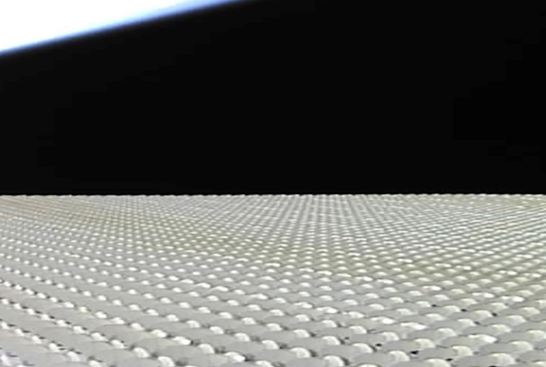 The BlueBird 6 satellite's large array in Earth orbit.