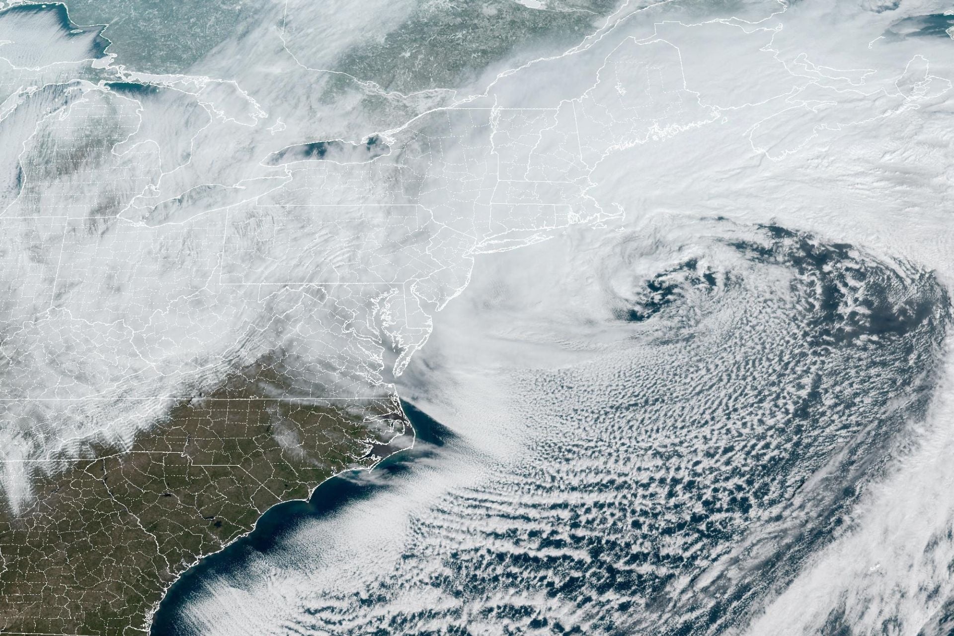 This GOES-19 satellite image shows a large offshore Nor'Easter impacting the Northeast U.S. on February 23, 2026