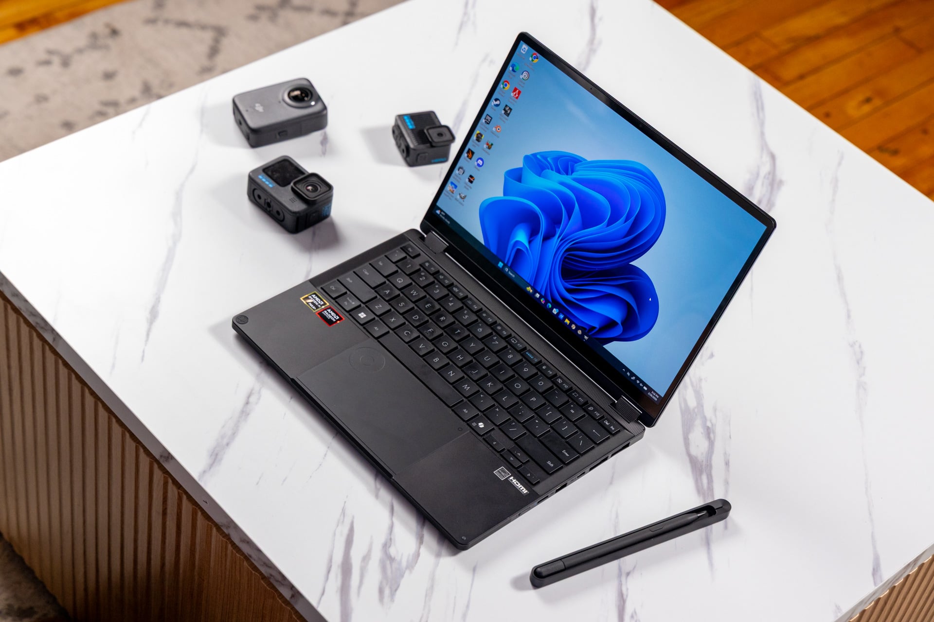 No, you don't get a few free GoPros with this $3,000 laptop, although that may have justified the price a bit more.