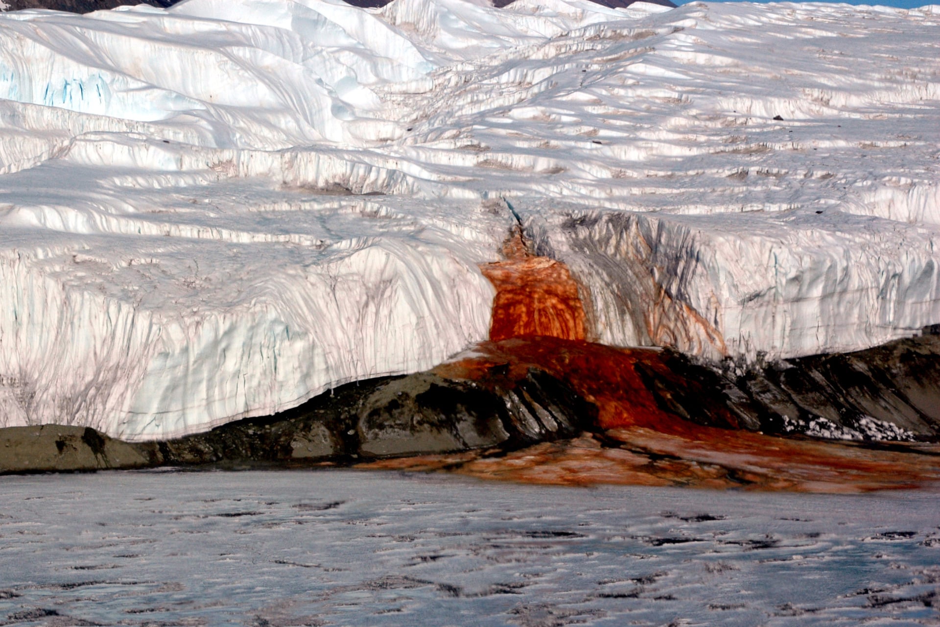 A photograph of the Blood Falls, an iconic landmark located at the end of the Taylor Glacier in East Antarctica.