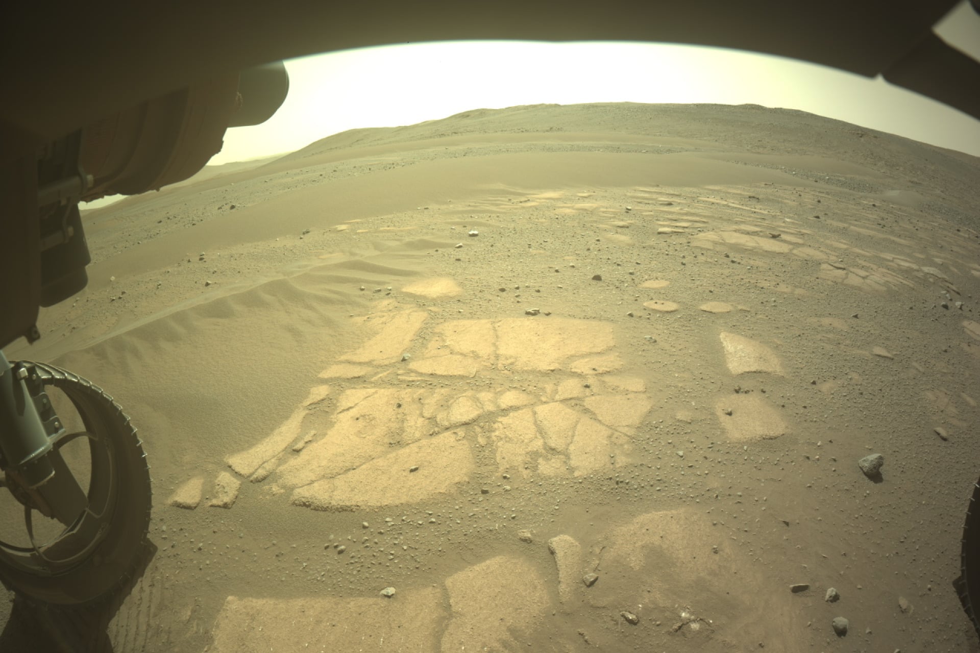 NASA's Mars Perseverance rover acquired this image of the area in front of it using its onboard Front Left Hazard Avoidance Camera A. This image was acquired on Dec. 8, 2025 (Sol 1707) at the local mean solar time of 13:48:26.