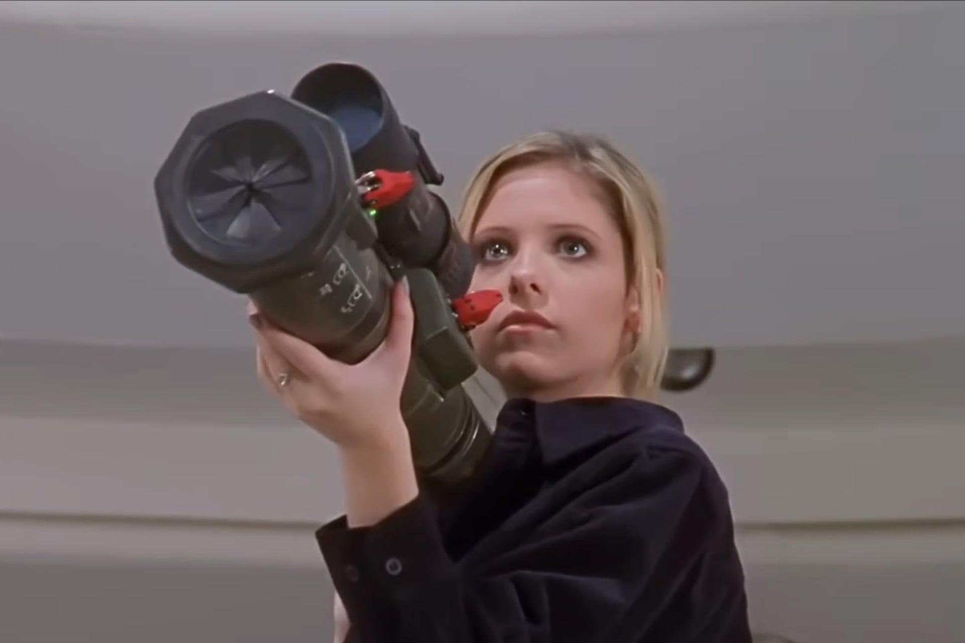 Buffy (Sarah Michelle Gellar) takes aim in a classic monster-hunting moment.