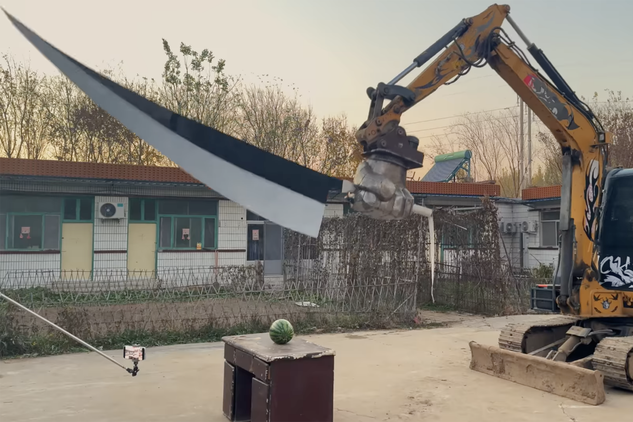YouTuber Resolves Fraternal Disagreement With Excavator and Hilariously Large Sword