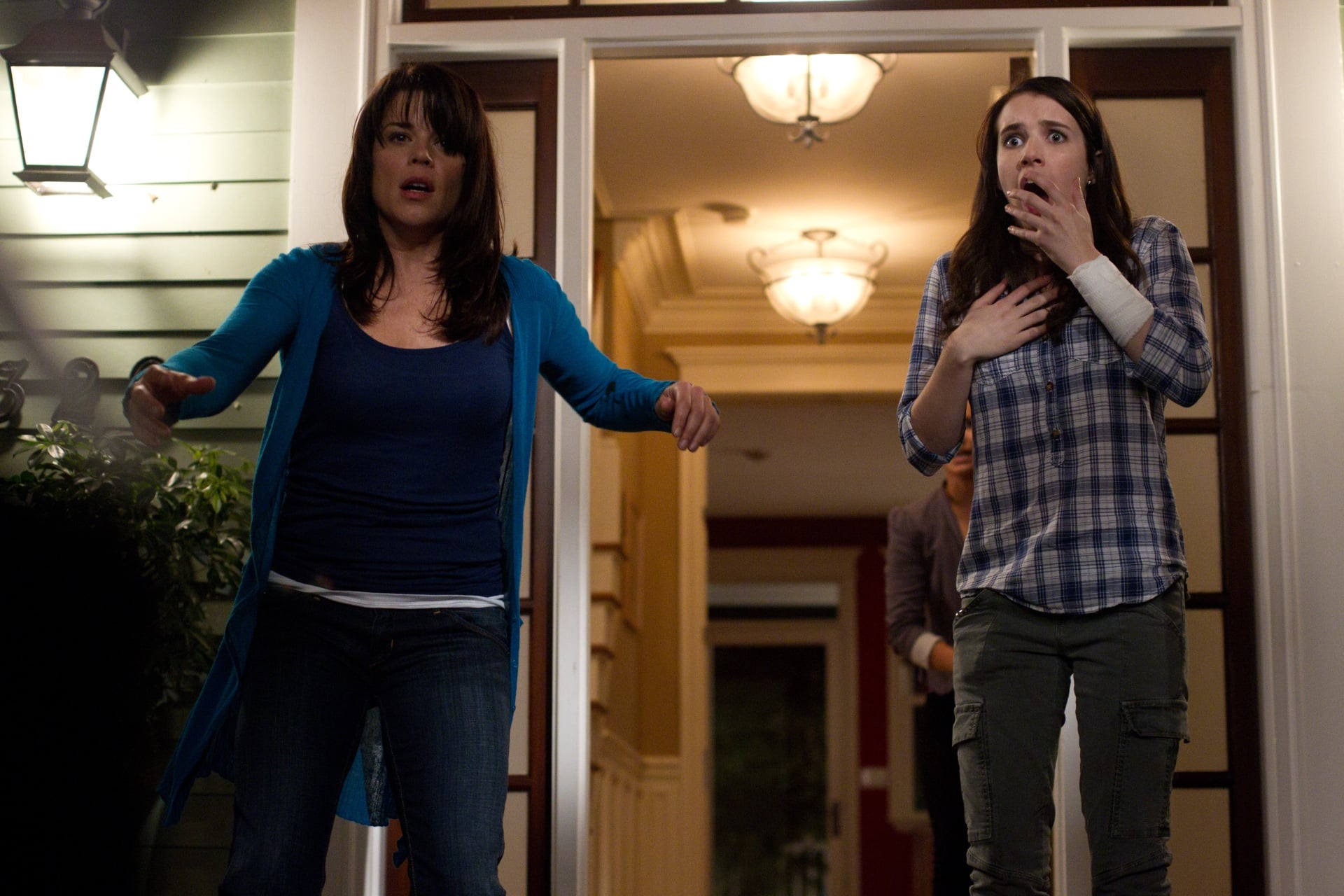 Sidney (Neve Campbell) and Jill (Emma Roberts) in 'Scream 4.'
